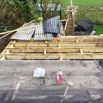 flat roof with Corrugated roof sheets and plywood 2